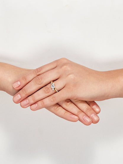 round 3-Stone Center Cubic Zirconia Engagement Ring in 10K Yellow Gold