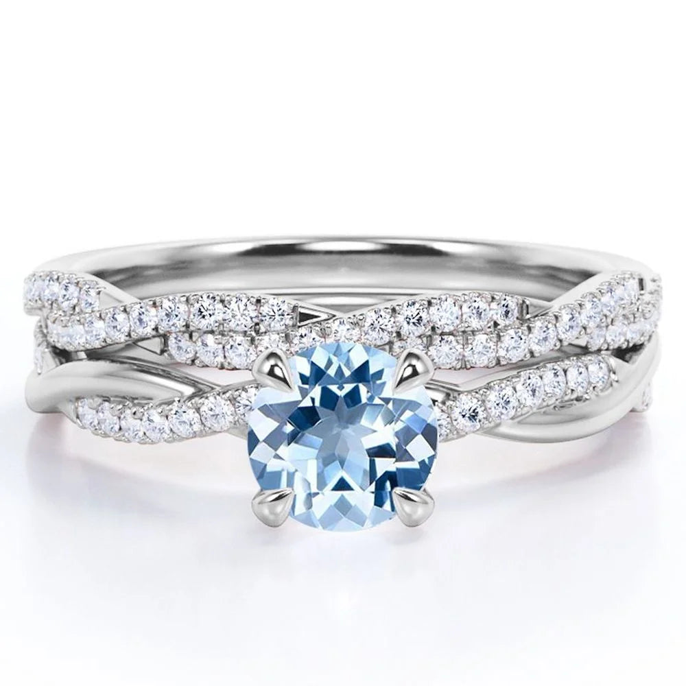 Twisted Pave - 1.75 Carat round Shaped Vivid Blue Created Aquamarine and Moissanite - Four Prong Wedding Set - 18K White Gold Plating over Silver