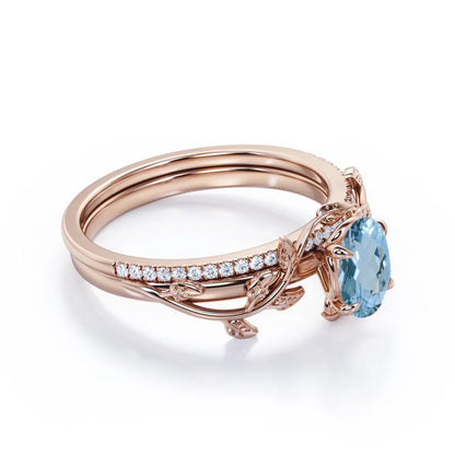 Prong Setting 1.5 Carat Ovate Brazilian Created Aquamarine and Moissanite Leaf Design Wedding Ring Set in 18K Rose Gold Plating over Silver