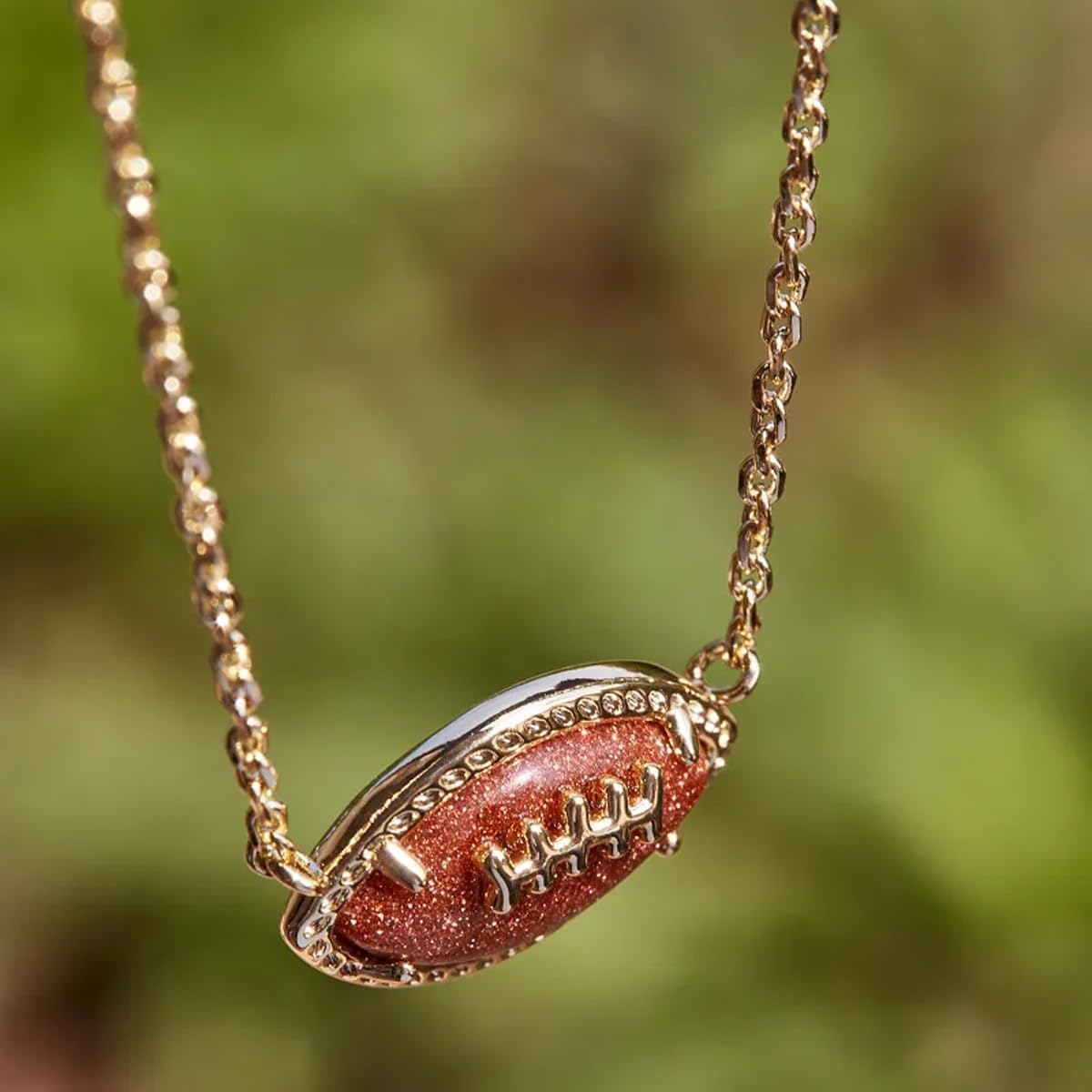 Gold Football Pendant Necklace with Orange Goldstone– Kendra Scott