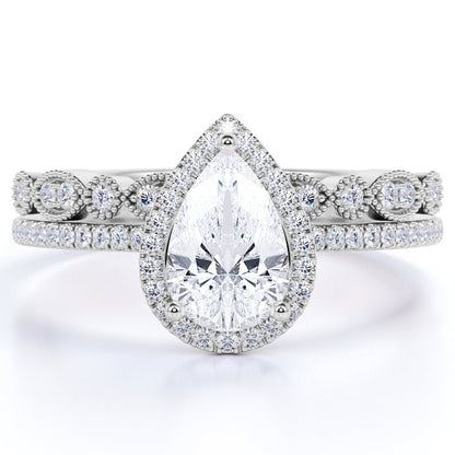 1.25 Carat Pear Cut Moissanite Wedding Ring Set in 18K White Gold over Silver