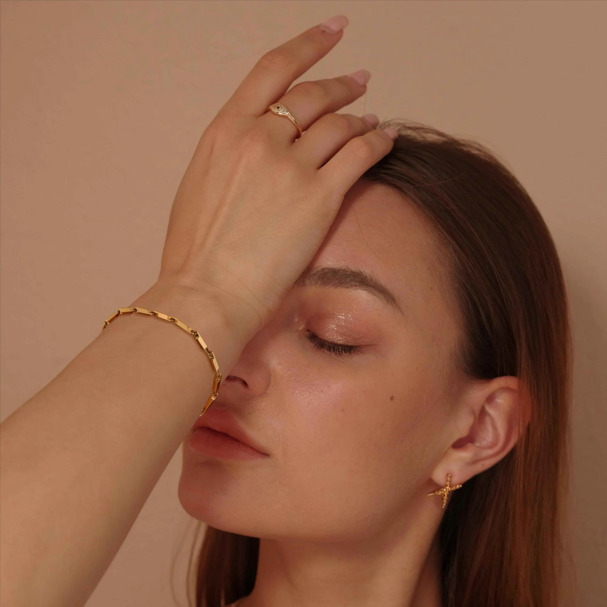 Woman with gold jewelry 