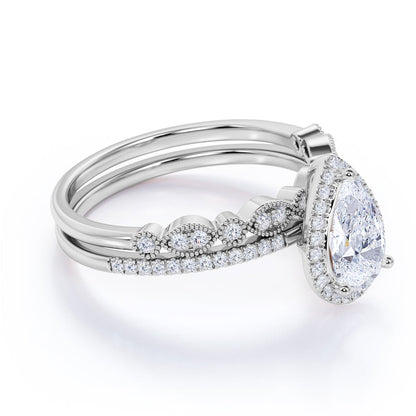 1.25 Carat Pear Cut Moissanite Wedding Ring Set in 18K White Gold over Silver